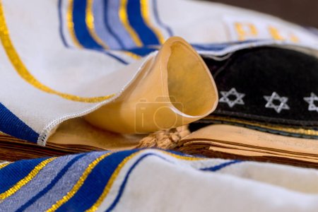 Photo for Jewish holiday symbols shofar prayer book shawl tallit kippah for holly days in synagogue - Royalty Free Image