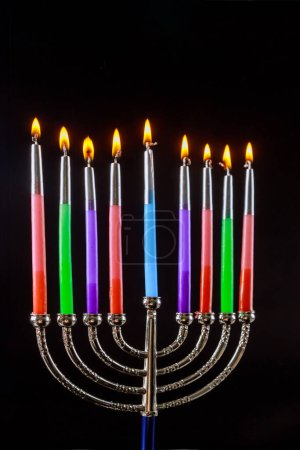 Photo for Traditional Hanukkah religious symbol depicting Hanukkah menorah with candles burning on it - Royalty Free Image