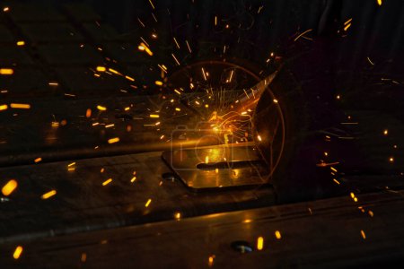 Photo for Sparks are generated during welding process of argon gas to steel at factory - Royalty Free Image