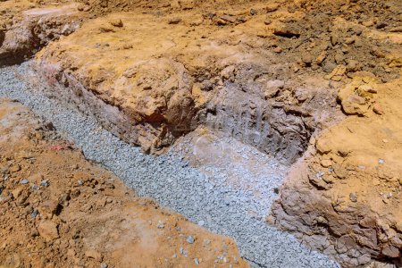 Photo for For pouring of concrete to foundations, trenches are being dug - Royalty Free Image