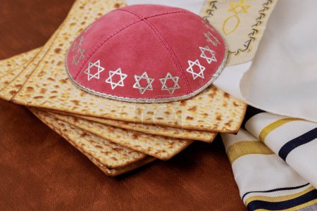 It is traditional Jewish ritual to celebrate Passover with unleavened matzah, kippahs, tallit