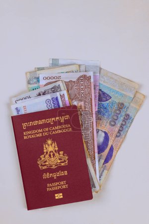 Passports Kingdom of Cambodia different denominations banknotes Cambodian National Currency