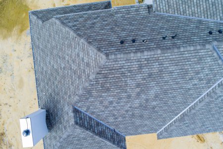 Asphalt shingles roof top newly constructed house