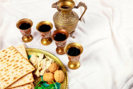 Kosher wine cup, matzah flatbread at passover embracing jewish pesach attributes