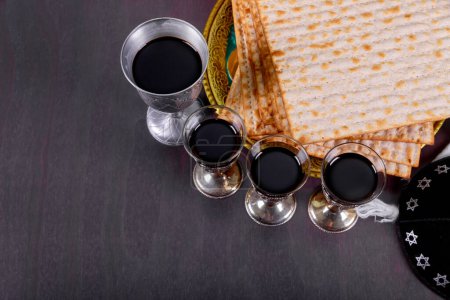 Passover wine cup features Pesach holiday symbols of matzah, an unleavened bread from Jewish tradition