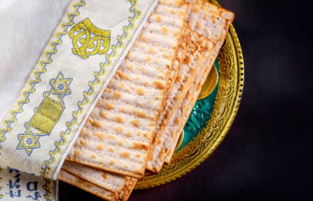 Photo for Passover celebration matzah unleavened bread centerpiece on Jewish holiday table - Royalty Free Image