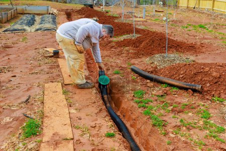 Installation of an underground drainage system to allow rainwater stormwater to exit