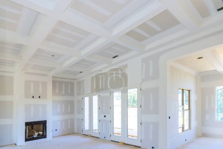 New home construction gypsum plaster walls interior finish drywall ready for paint