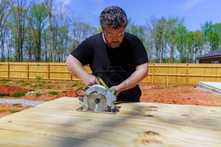 Handsaw is used by carpenter in trimming plywood boards