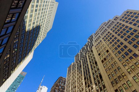 An Manhattan New York City USA skyscrapers, business office buildings, urban landscape from below up