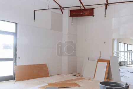 Photo for Newly constructed house walls are plasterboard drywall ready for plastering - Royalty Free Image
