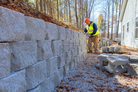 Photo for Concrete block retaining wall was mounted by contractor - Royalty Free Image