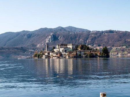 Photo for Orta San Giulio, Italy: a village located halfway along the eastern shore of Lake Orta - Royalty Free Image