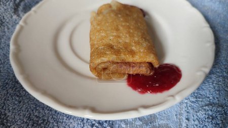 pancakes with cherries on a white plate, food dessert, delicious breakfast. High quality photo