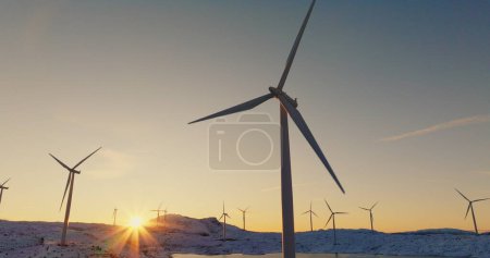 Renewable Dawn: Wind Turbines Against the Morning Sky in Norway. High quality 4k footage