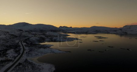 Twilight Serenity: Snow-Covered Islands in Norway. High quality 4k footage