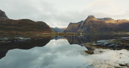 Mirror of Nature: Serene Reflections in Lofotens Fjord at Dawn. High quality 4k footage