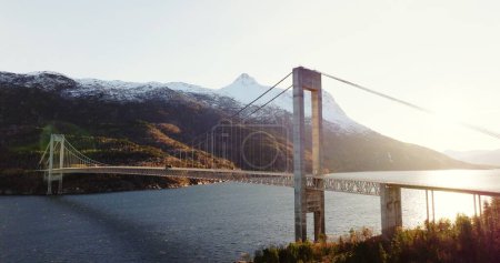 Skjombrua Bridge Amidst Winter Glow: Norways Scenic Splendor. High quality 4k footage