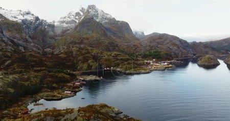 Nusfjords Harmony: Aerial Panorama of a Traditional Fishing Village in Lofoten. High quality 4k footage