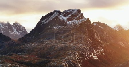 Sunset Embrace: The Lofoten Giants Golden Hour. High quality 4k footage