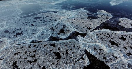 Arctic Puzzle: Aerial View of Fragmented Sea Ice in Norway. High quality 4k footage