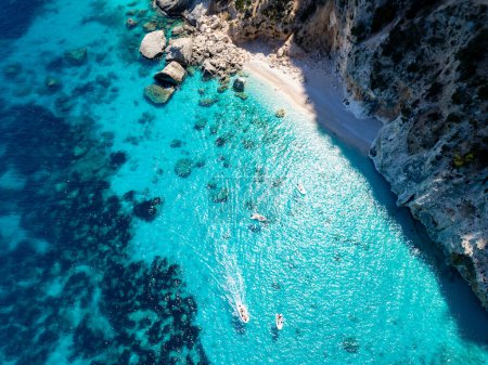 Photo for A drone view of Cala Goloritze, an azure beach located in the town of Baunei, in the southern part of the Gulf of Orosei, in the Ogliastra region of Sardinia. - Royalty Free Image