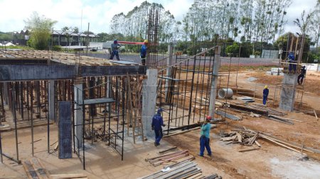 Photo for Ilheus, bahia, brazil - october 7, 2022: workers during construction of a polyclinic of the Estada da Bahia in the city of Ilheus - Royalty Free Image
