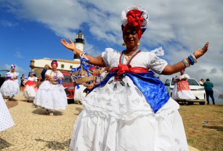 Salvador, bahia, brazil - july 4, 2023: baianas make the reception at Farol da Barra during the factory launch of the Chinese automaker BYD, which will open a factory in the city of Camacari.