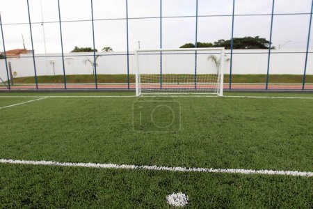 Photo for Boninal, bahia, brazil - april 29, 2023: view of a society field with synthetic grass in a full-time state school in the city of Boninal. - Royalty Free Image