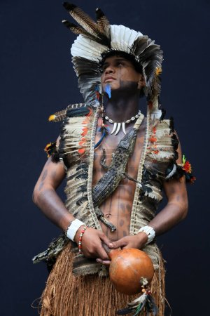 Photo for Porto seguro, bahia, brazil - august 1, 2023: Etina Pataxo Indians seen during the Aragwaka festival in the Jaqueira village in the city of Porto Seguro. - Royalty Free Image