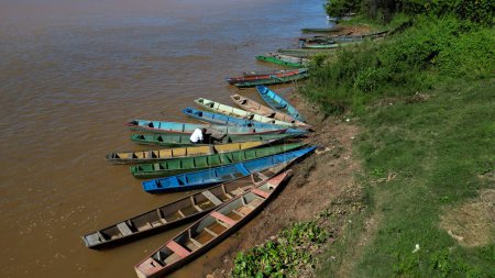 carinhanha, bahia, brazil - april 13, 2024: Fisherman's canoes are seen stuck on the banks of the Sao Francisco River in the city of Carinhanha