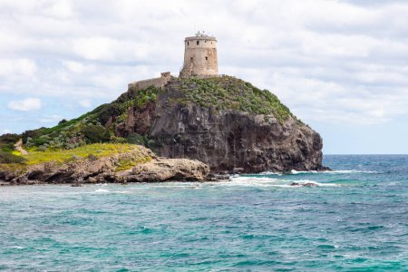 lighthouse on the shore of the island, Sardinia, Italy