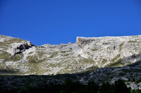 Photo for On the side of the Prato Piazza plateau, slabs of rock form the bases of Picco Vallandro - Royalty Free Image