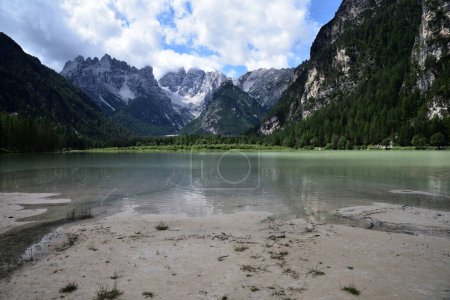 Photo for The shallow waters of Lake Landro in the scenery of the Cristallo dolomite group - Royalty Free Image
