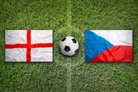 England vs. Czech Republic flags on green soccer field