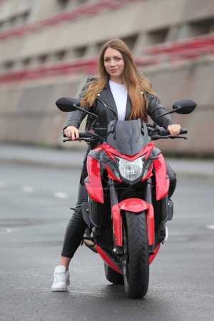 Photo for Young girl on a motorcycle in the summer - Royalty Free Image