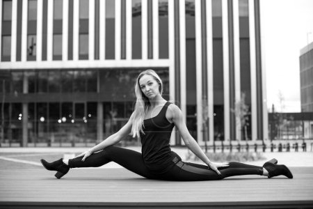 Photo for Young beauty athletic girl with good flexibility - Royalty Free Image