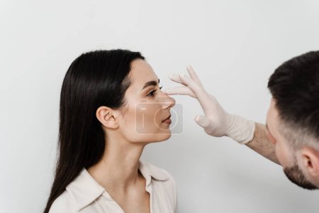 Rhinoplasty is reshaping nose surgery for change appearance of the nose and improve breathing. Consultation with ENT before rhinoplasty plastic surgery to change nose shape and improve breathing