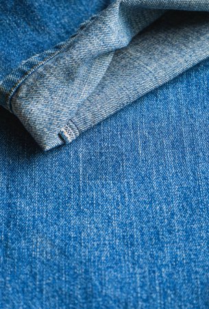 Téléchargez les photos : Gros plan de fond de texture de jean bleu - en image libre de droit
