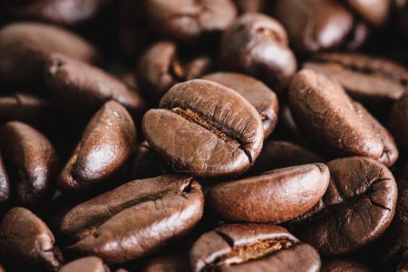 Photo for Roasted coffee beans on a wooden background - Royalty Free Image