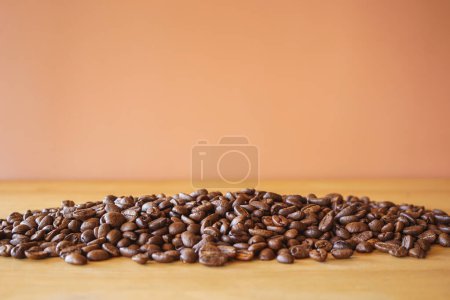 Photo for Coffee beans on wooden table - Royalty Free Image