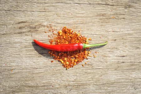 Photo for Red chili pepper on a wooden background - Royalty Free Image