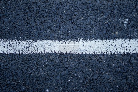 Photo for Asphalt surface with white stripes - Royalty Free Image