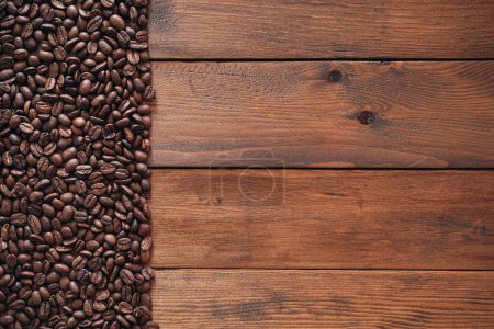 Photo for Coffee beans on wood background - Royalty Free Image