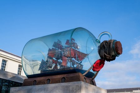 Photo for Greenwich.London.United Kingdom.December 1st 2022.Photo of Nelson's Ship in a bottle on a plinth outside the National Maritime Museum in Greenwich - Royalty Free Image