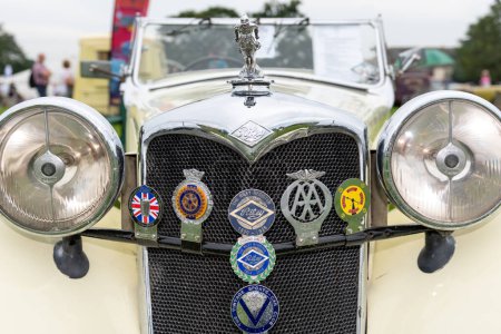 Photo for Honiton.Devon.United Kingdom.July 2nd 2021.Close up of the front of a vintage Riley car - Royalty Free Image