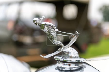 Photo for Honiton.Devon.United Kingdom.July 2nd 2021.Close up of the bonnet ornament on a vintage Riley car - Royalty Free Image
