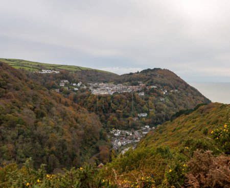 Photo for View from Beacon Tor on Countisbury Hill of the autumn colours at Lynton and Lynmouth in Devon - Royalty Free Image