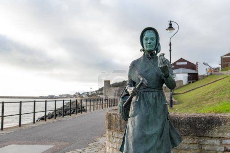 Photo for Photo of the Mary Anning bronze statue at Lyme Regis in Dorset - Royalty Free Image
