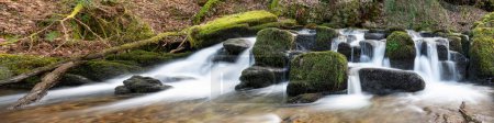 Long exposure of a waterfall on the Hoar Oak Water river at Watersmeet in Exmoor National Park